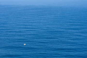 Small Boat On A Vast Open Ocean, Cape Town, South Africa