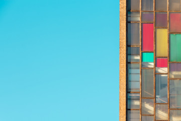 Old industrial building, large dirty windows, brick wall