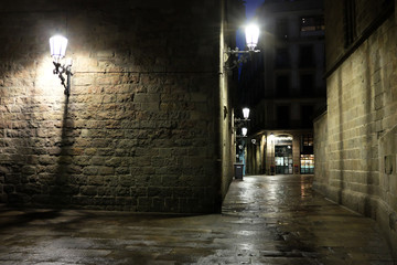 Barcelona, Spain - April 26: Night scenery of the streets with shining lamps on the walls on April 26, 2017 in Barcelona, Spain.