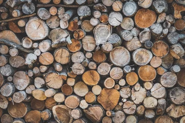 Möbelaufkleber Stacked wood logs © Visual Motiv