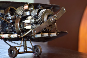 The plane is a toy made of steel and various equipment. Assembled together