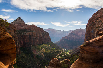 View of the winding mountain road from Canyon Overlook trail in Zion National Park