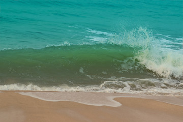 Fototapeta na wymiar Sea water and wind wave On the beautiful sandy beach