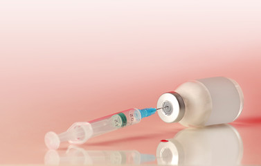 Fototapeta na wymiar Syringe and ampoule with vaccine, abstract background. Virus epidemic concept, medical concept.