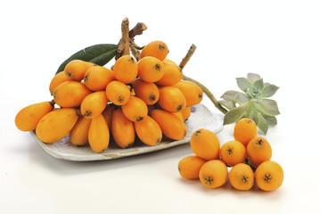 the loquat with decoration on the white background