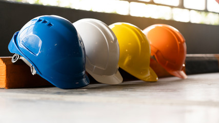 Safety Construction Worker Hats Blue, white, yellow, orange. Teamwork of construction team must...