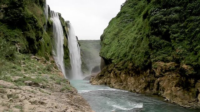 River and amazing crystalline blue water of Tamul waterfall in San Luis Potos&iacute;, Mexico