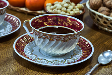 Vintage coffee cup with saucer and teaspoon