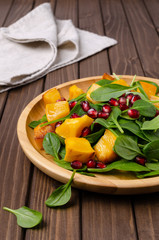 Spinach salad and baked pumpkin