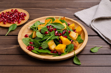 Spinach salad and baked pumpkin