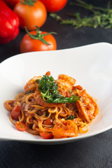 Pasta with meat, tomato sauce and vegetables