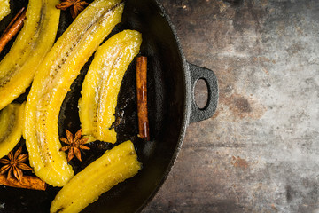 Grilled bananas with anise and cinnamon spices. Selective focus. Shallow depth of field.