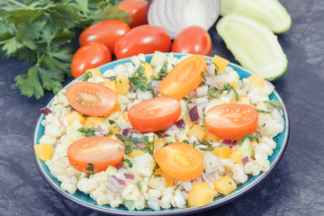 Fresh salad with bulgur groats and vegetables. Healthy lifestyles and nutrition