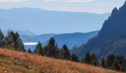 Mountain landscape, morning haze. Traveling in the mountains, trekking.