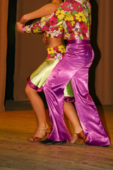 Latino dancers in ballroom