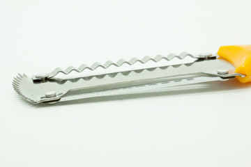 Paring knife with two sharp edges on a white background,selective focus
