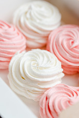 white and pink marshmallows in a box
