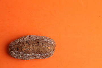 Fototapeta premium artisanal brown bread with nut pieces
