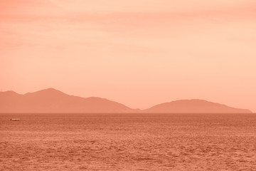 Beautiful seascape in the morning. Hoi An, Vietnam. Orange color toned