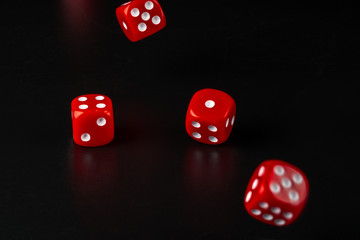 Group of dice close up on dark black background