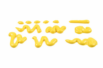 Yellow cheese sauce splashes isolated on white background.