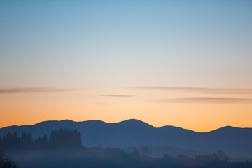 view of sunrise in mountains range
