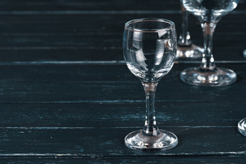 Empty  glasses for drinks on dark background