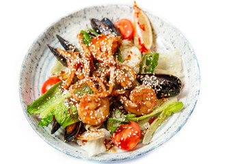 Fresh seafood salad, mussels, shrimp, fresh vegetables and herbs.