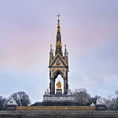 Albert Memorial with golden prince statute (opened in 1872) in Kensington, London, clear cold winter afternoon sky in background