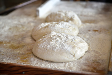 Fototapeta na wymiar preparing dough balls for baking