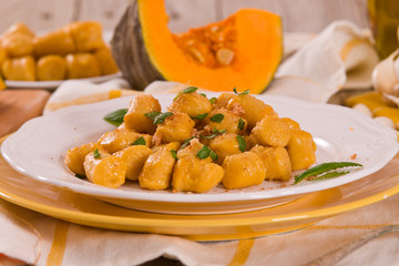 Pumpkin gnocchi with grated amaretti cookies.