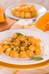 Pumpkin gnocchi with grated amaretti cookies.