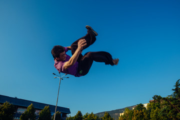 Acrobat practicing parkour