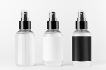 Spray bottles collection for cosmetics transparent and black, white blank labels on white background, mock up for branding, advertising, design.