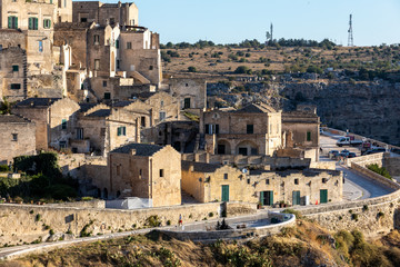 Obraz premium View of the Sassi di Matera a historic district in the city of Matera, well-known for their ancient cave dwellings. Basilicata. Italy