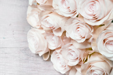 Obraz na płótnie Canvas Pink roses pattern background in soft pastel colours. Wedding consept