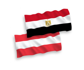 National vector fabric wave flags of Austria and Egypt isolated on white background. 1 to 2 proportion.