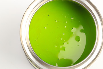 Can with green paint  isolated on white background