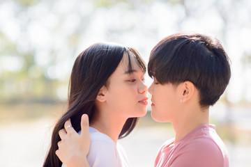 Obraz premium LGBT Asian woman young lesbian lovers kissing on Valentine's Day