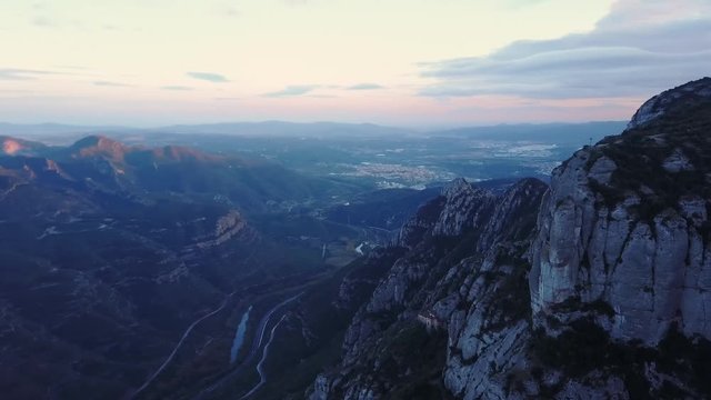 aerial pan right reaveal mountain monastery