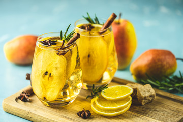 Festive summer drinks, pear spice cocktail. Hot drink cocktail for Christmas, winter or autumn...