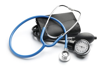 Sphygmomanometer and stethoscope on white background