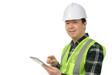 Middle-aged Asian engineer using tablet PC on a white background.
