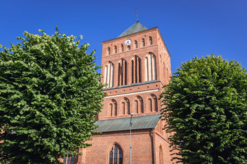 Fototapeta na wymiar Bell tower of Roman Catholic Church of Our Lady of Perpetual Help in Swidwin, small city located in West Pomerania region of Poland