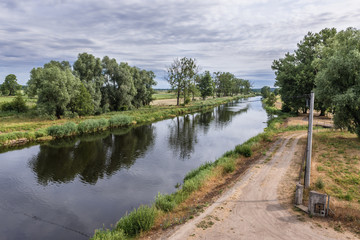 Fototapeta na wymiar View from bridge over River Notec in Czarnkow town located in West Pomerania region of Poland