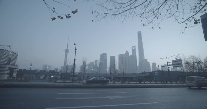 Shanghai morning skyline with cars and buses