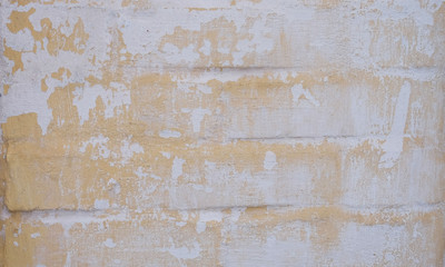 yellow and white painted brick wall texture