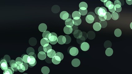 Pale green lights bokeh pattern on black background