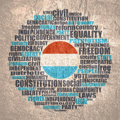 Word cloud with words related to politics, government, parliamentary democracy and political life. Flag of the Luxembourg.