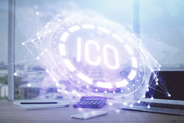 Double exposure of blockchain theme hologram and table with computer background. Concept of bitcoin crypto currency.